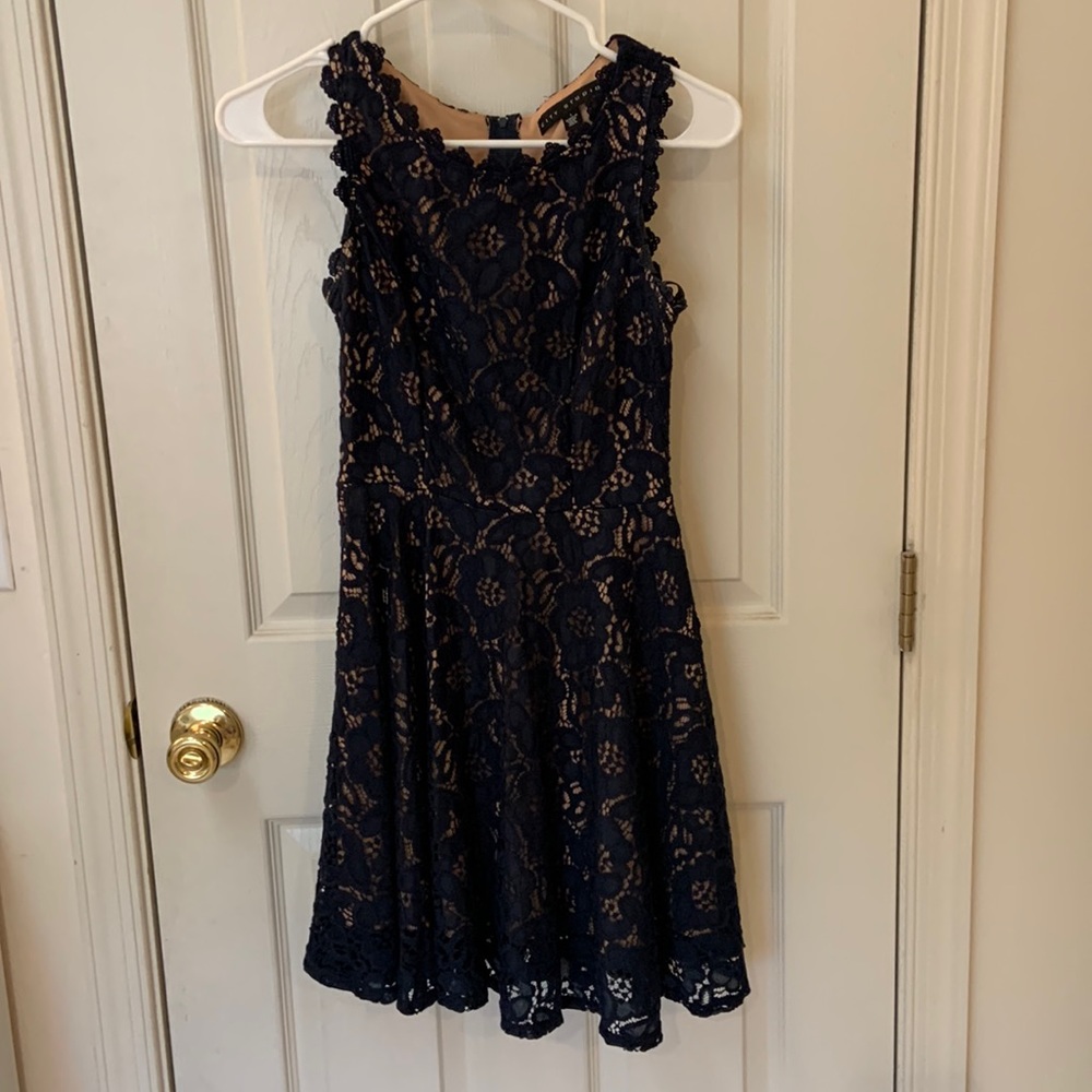 Juniors size 1 navy blue lace overlay dress. Beautifully lined and detailed